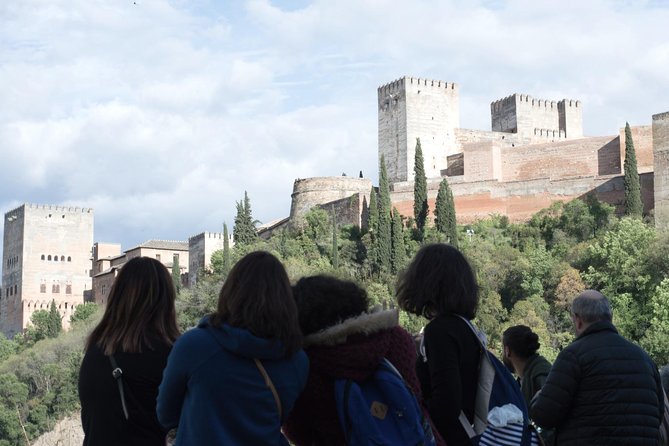 Granada's Hidden Treasures: Albayzin and Sacromonte Walking Tour - Paseo de los Tristes and the Tapas Finish