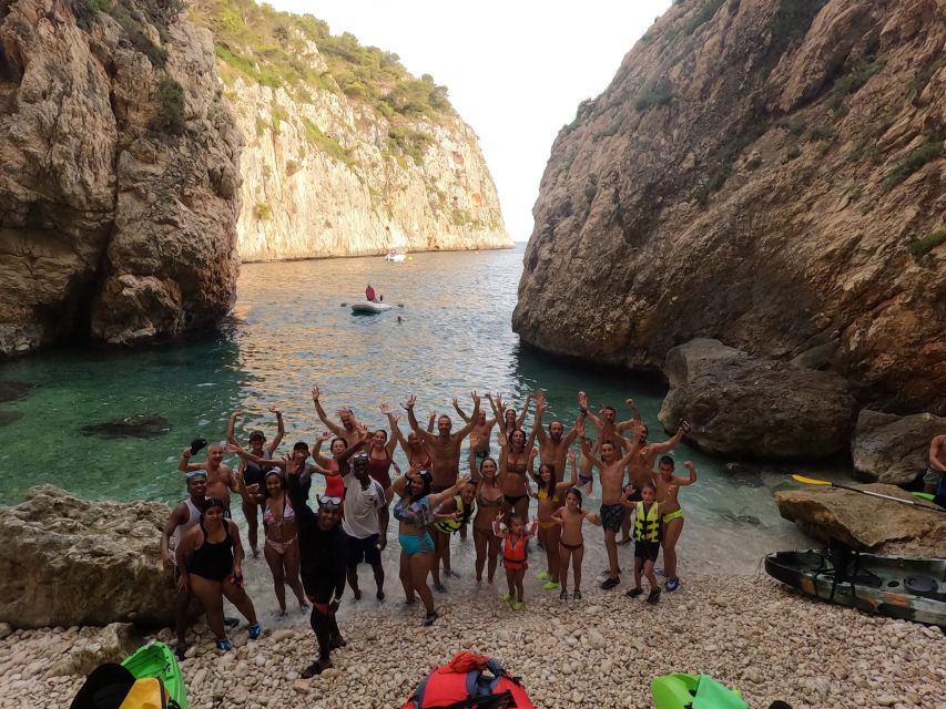 Granadella: Caló, Cova Llop Marí, and Ambolo Kayak Trip - Cala en Caló, the swimming highlight