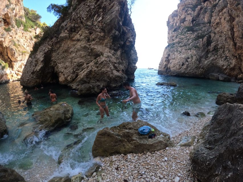 Granadella: Caló, Cova Llop Marí, and Ambolo Kayak Trip - What the guides add