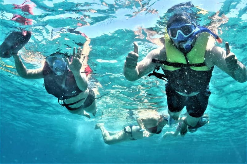 Ibiza: Snorkeling, Sunset Beach and Cave Boat Trip - Second stop: turquoise water and rocky coves