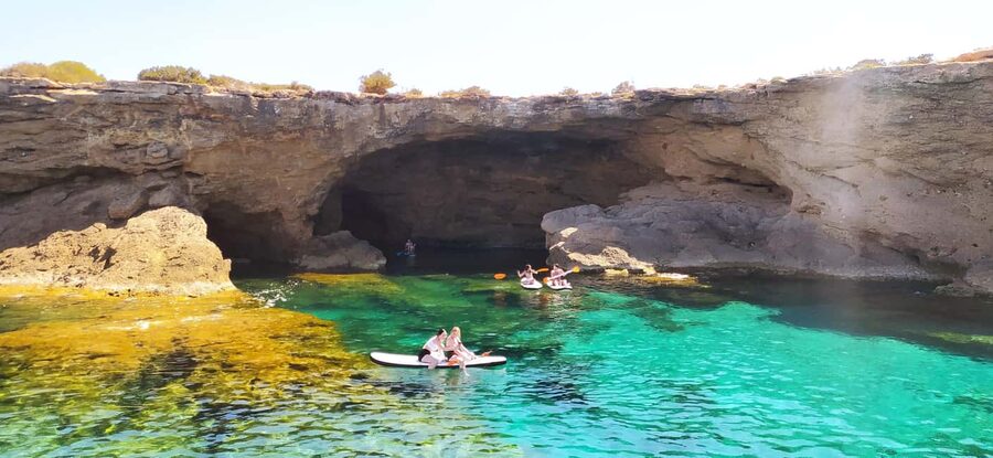 Ibiza: Snorkeling, Sunset Beach and Cave Boat Trip - An open bar, music, and a social mood