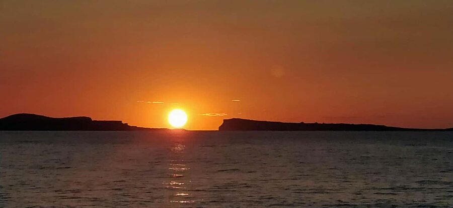 Ibiza: Snorkeling, Sunset Beach and Cave Boat Trip - Sailing west past Ibiza’s coves and landmarks