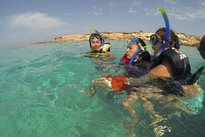Ibiza Sunset Snorkeling Beach and Cave Tour - Cala Bassa, swimming in a famous cove