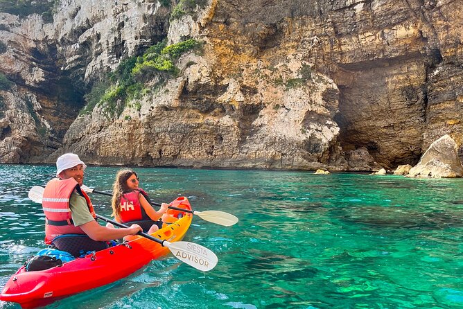 Kayak Paradise: Cala Portixol Snorkel, Cave & Cliff Jumping Tour - Cala el Pom, a quiet first taste of the coast