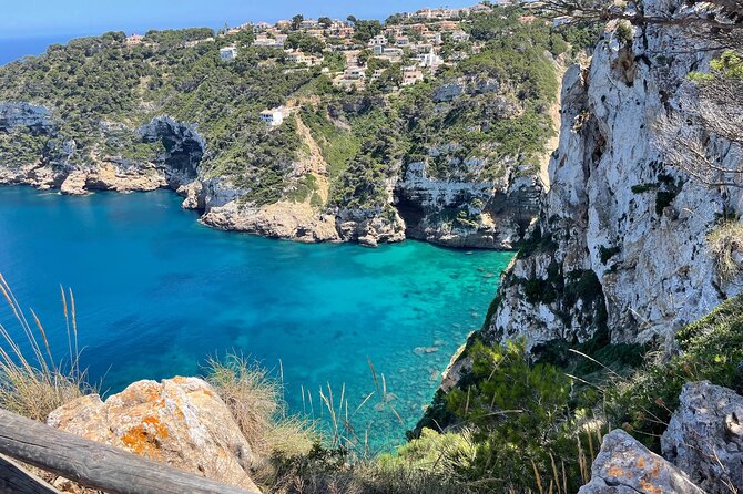Kayak Paradise: Cala Portixol Snorkel, Cave & Cliff Jumping Tour - Isla de Portixol and the natural blue lagoon