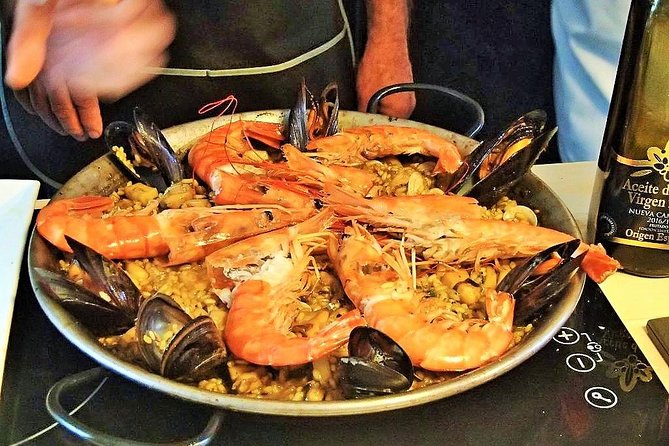 La Boqueria Market and Paella Cooking Class in Barcelona - From Plaça Reial to Barcelona’s food market