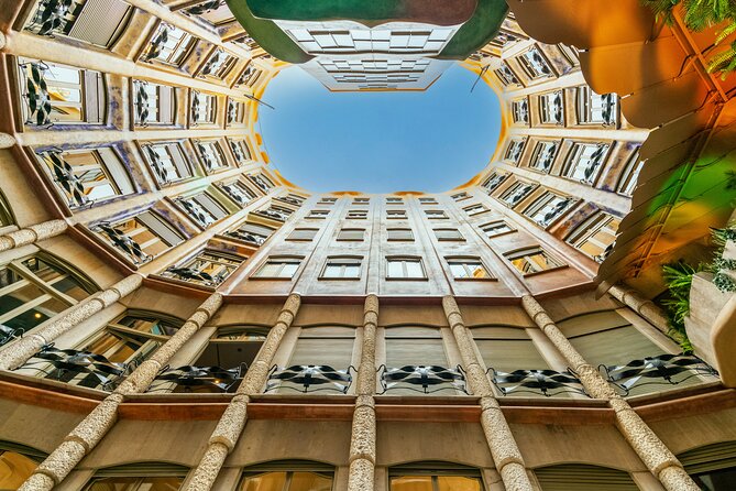 La Pedrera-Casa Mila Admission Ticket with Audioguide - Getting inside and starting at the courtyards