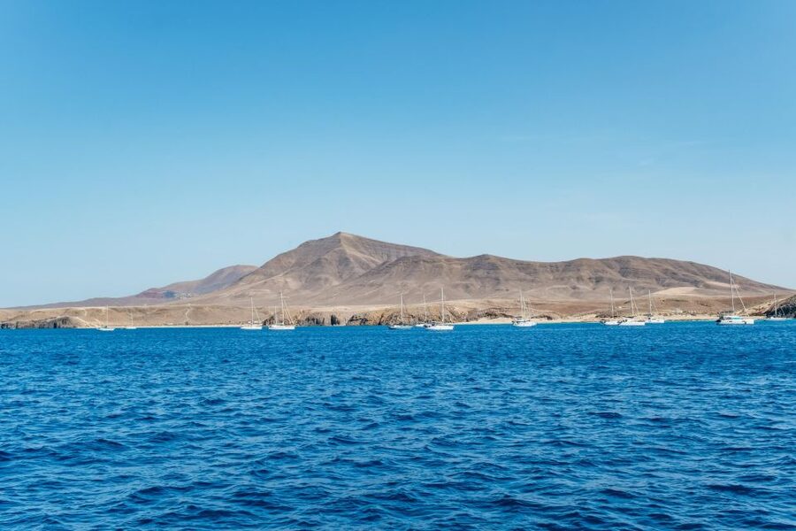 Lanzarote: Day Trip to the Papagayo Beaches by Catamaran - Swimming, kayaking, and snorkeling from the boat