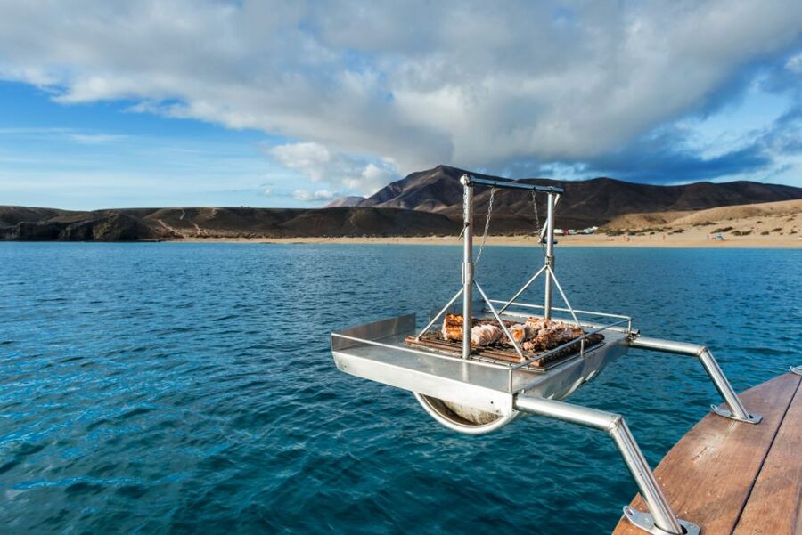 Lanzarote: Half-Day Chill Out Cruise at Papagayo Beach - The onboard BBQ is more than a basic boat lunch