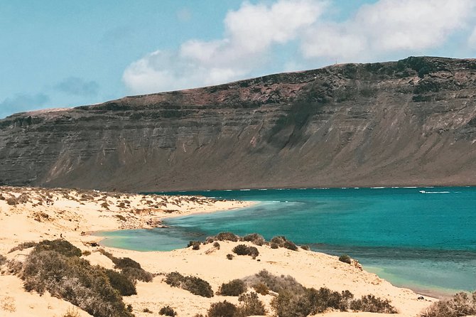 Lanzarote: La Graciosa island cruise with lunch and water activities - Paella, Sangria, and the Social Side of the Cruise