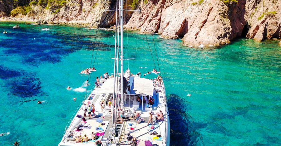 Lloret de Mar: Catamaran Sailing Cruise with BBQ and Drinks - From Lloret beach to open water