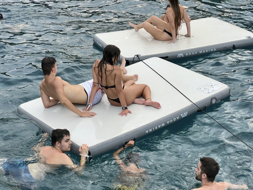 Lloret de Mar: Sunset Catamaran Cruise with DJ and Drinks - Five drinks and a live DJ