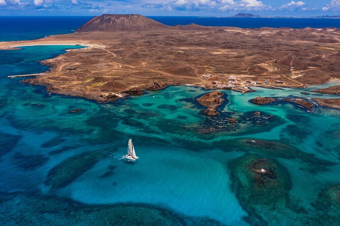 Lobos Island Half-Day Sailing Tour with Lunch - Anchoring off Playa de la Concha