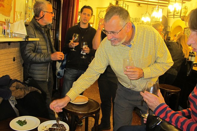Madrid by Night Small Group Tour: Stories, Sights and Tapas Bites - Drinks are part of the local lesson