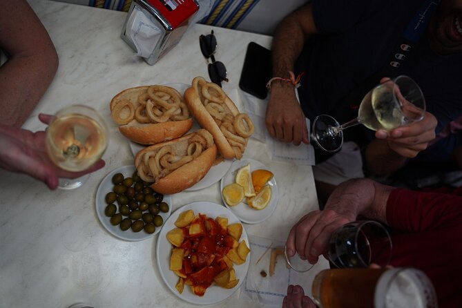 Madrid by Night: Tapas Crawl, Local Drinks & Hidden Gems - La Latina and a six-table restaurant