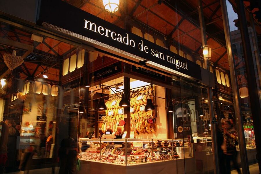 Madrid: City Highlights Guided Walking Tour - Almudena Cathedral beside the palace