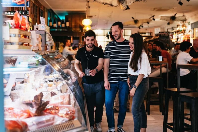 Madrid: Guided Tapas and Wine Tour with Terrace Visit - Plaza de Santa Ana and the rooftop finish