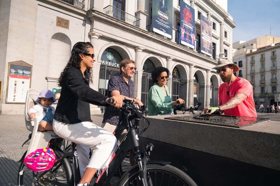 Madrid: Highlights Bike Tour with Optional E-Bike or Tapas - Starting near Calle de Santiago and getting set up