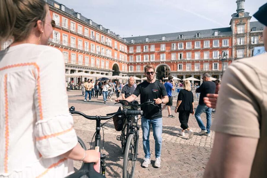 Madrid: Highlights Bike Tour with Optional E-Bike or Tapas - The CaixaForum wall and the Prado district