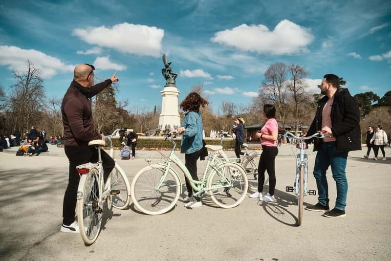 Madrid: Highlights Guided Vintage Bike Tour and Tapas Option - What the guides add to the ride