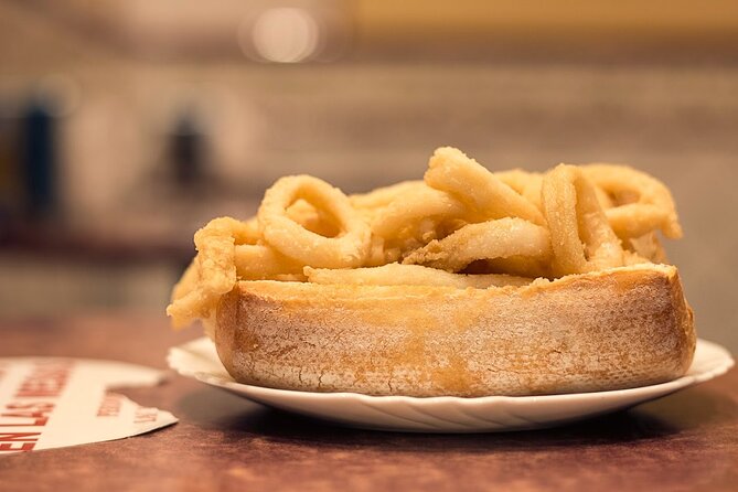 Madrid Historic Centre Food Tour with Authentic Tapas & Wines - Tapas, cider, and the local vermouth habit
