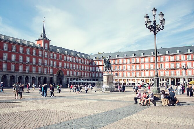 Madrid Historic Centre Food Tour with Authentic Tapas & Wines - Finishing inside an 18th-century building