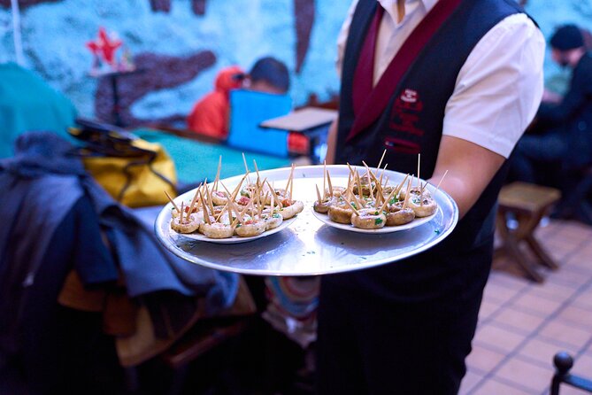 Madrid: Not Just Another Tapas & Wine Tour by Eating Europe - La Trucha and the rice dish beyond paella