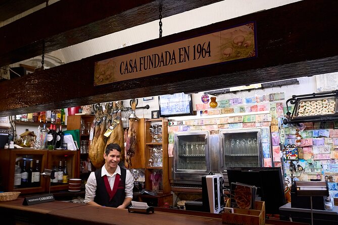 Madrid: Not Just Another Tapas & Wine Tour by Eating Europe - Mercado de San Miguel and the changing center of Madrid