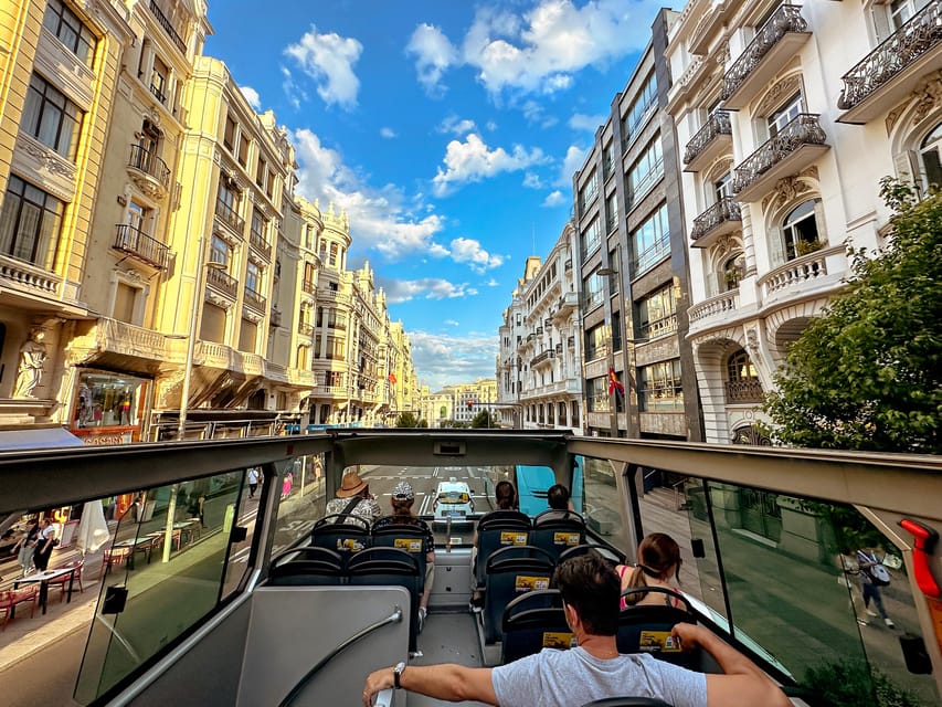 Madrid: Panoramic Open-Top Bus Day or Night Tour with Guide - Starting beside the Neptune Fountain and Prado