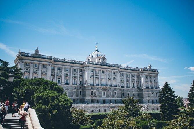 Madrid: Royal Palace Guided Tour with Skip the Line Ticket - Inside the palace: grand rooms and royal stories