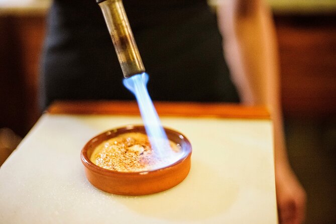 Madrid Tapas & Paella Cooking Experience with Local Market Visit - What Mercado de Antón Martín Adds