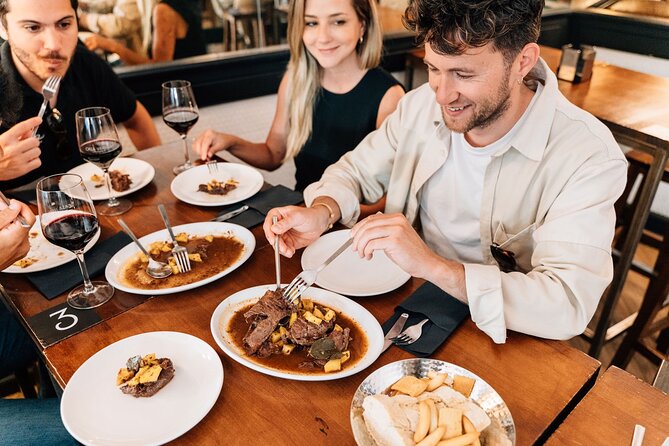 Madrid Tapas & Wine Tour with Rooftop Views and Local Guide - Guides, group size, and the feel of the evening
