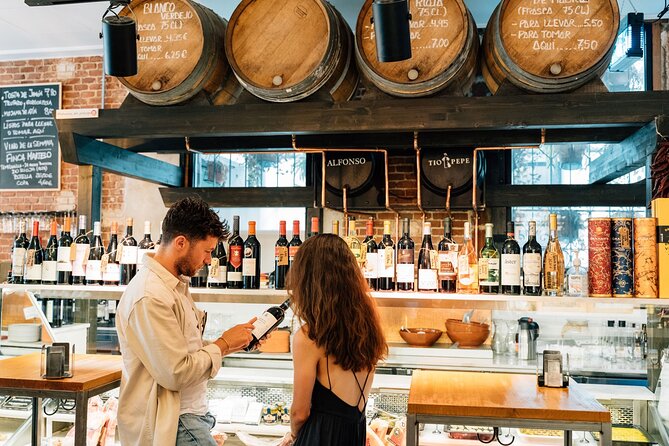 Madrid Tapas & Wine Tour with Rooftop Views and Local Guide - Plaza de San Miguel and La Latina: your first taste of tapeo
