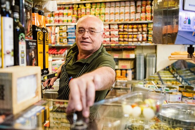 Madrid Ultimate Spanish Cuisine Food Tour - The famous calamari sandwich near Plaza Mayor