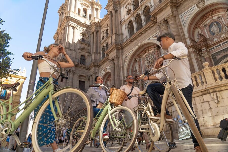 Málaga: Highlights, Hidden Gems and Coast Vintage Bike Tour - Plaza de la Merced and the Alcazaba