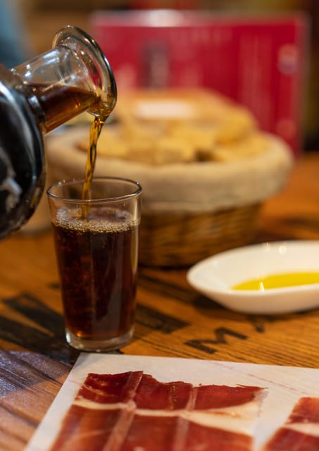Málaga: Wine & Tapas Tour - The small bar devoted to sausage, cheese, and vermouth