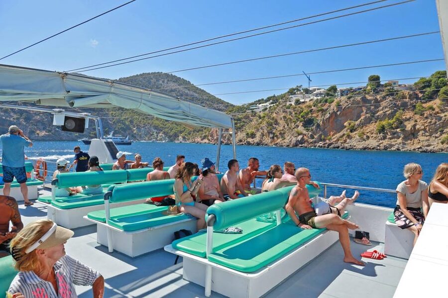 Mallorca: 2-Hour Coastline & Malgrat Islands Catamaran Tour - Life onboard: music, drinks, and the glass-bottom view