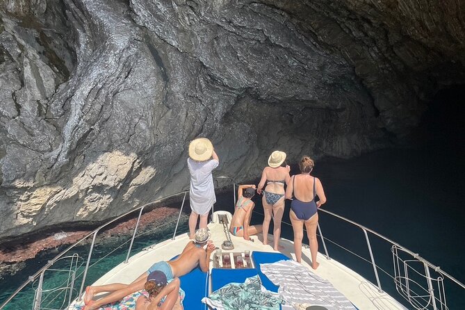 Mallorca Beach & Caves 4hr Boat Trip Drinks, Tapas, SUP & Snorkel - Leaving Port d’Alcúdia for the open coast