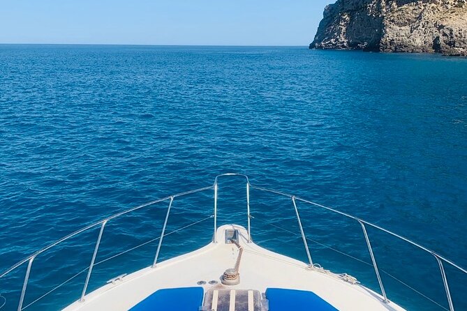 Mallorca Beach & Caves 4hr Boat Trip Drinks, Tapas, SUP & Snorkel - Coastal caves and cliff views from the boat