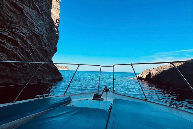 Mallorca Beach & Caves 4hr Boat Trip Drinks, Tapas, SUP & Snorkel - Alcanada Lighthouse and the second water stop