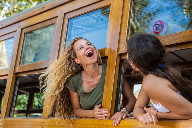 Mallorca in One Day Sightseeing Tour with Boat Ride and Vintage Train - Port de Sóller and the crowded tram