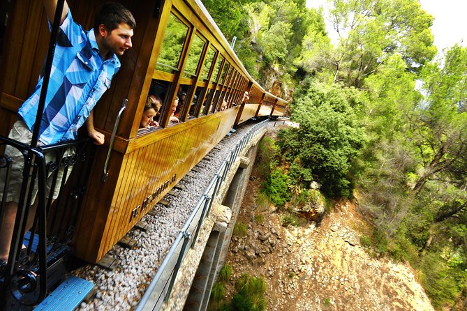 Mallorca in One Day Sightseeing Tour with Boat Ride and Vintage Train - Entering the Serra de Tramuntana by coach