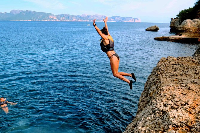 Mallorca: Kayaking, Sea Cave, Cliff Jumping & Snorkel Tour - The coastal walk and optional cliff jump