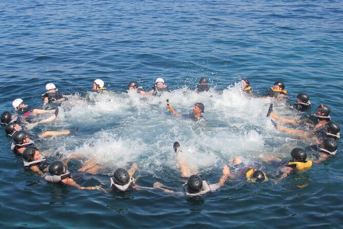 Mallorca: Kayaking, Sea Cave, Cliff Jumping & Snorkel Tour - Guides, safety, and the group atmosphere