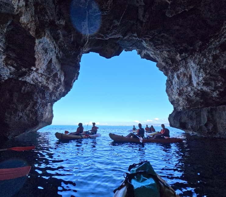 Mallorca: Sea Cave Kayaking Tour with Snorkeling and a Snack - Paddling beneath Mallorca’s cliffs