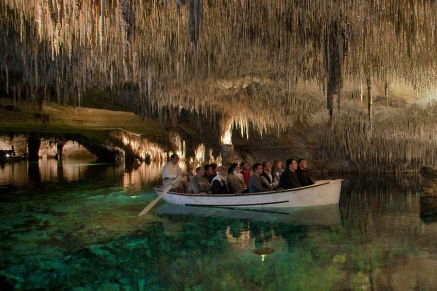 Mallorca: Ticket for Caves of Drach with Pickup Service - Boat ride or bridge across Lake Martel