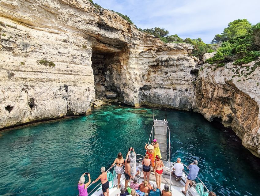 Menorca: Full-Day Boat Tour with Paella Lunch - Seeing Macarella and Macarelleta from the sea