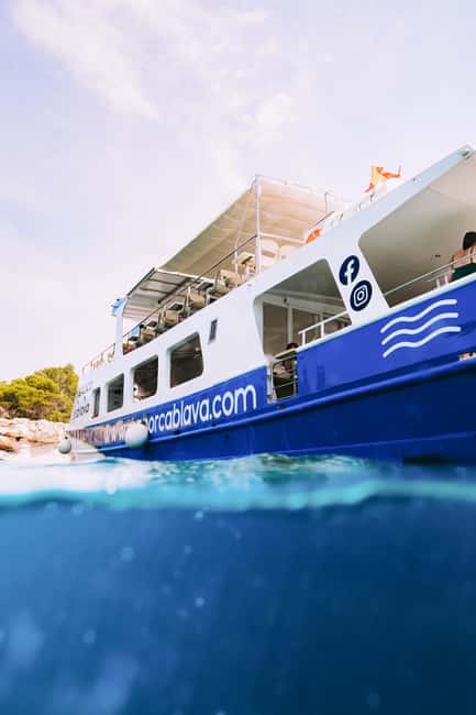 Menorca: Natural Coves and Beaches Boat Trip & Paella Lunch - Macarella and Macarelleta from the water