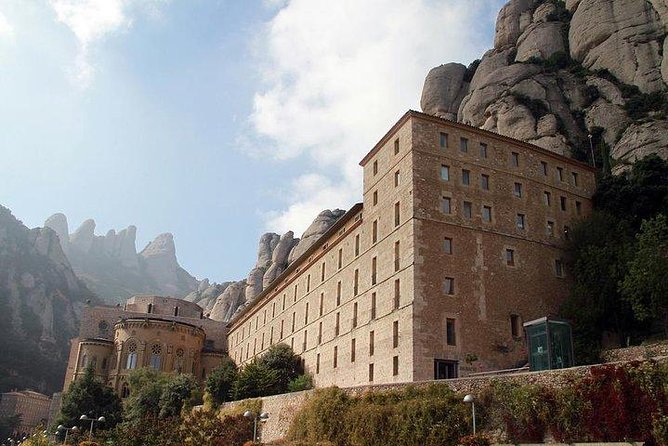 Montserrat Day Trip Private or Small Group with Basilica Tickets - Seeing La Moreneta inside the basilica