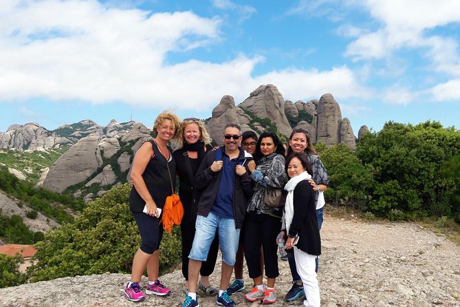 Montserrat Half Day with Cable Car and Easy Hike from Barcelona - Reaching the upper mountain by cable car